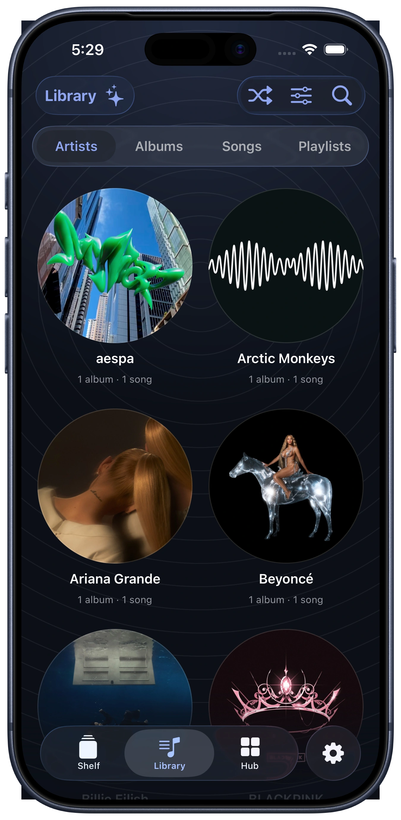 Artists in the aud-io Library shown on an iPhone 17 Pro