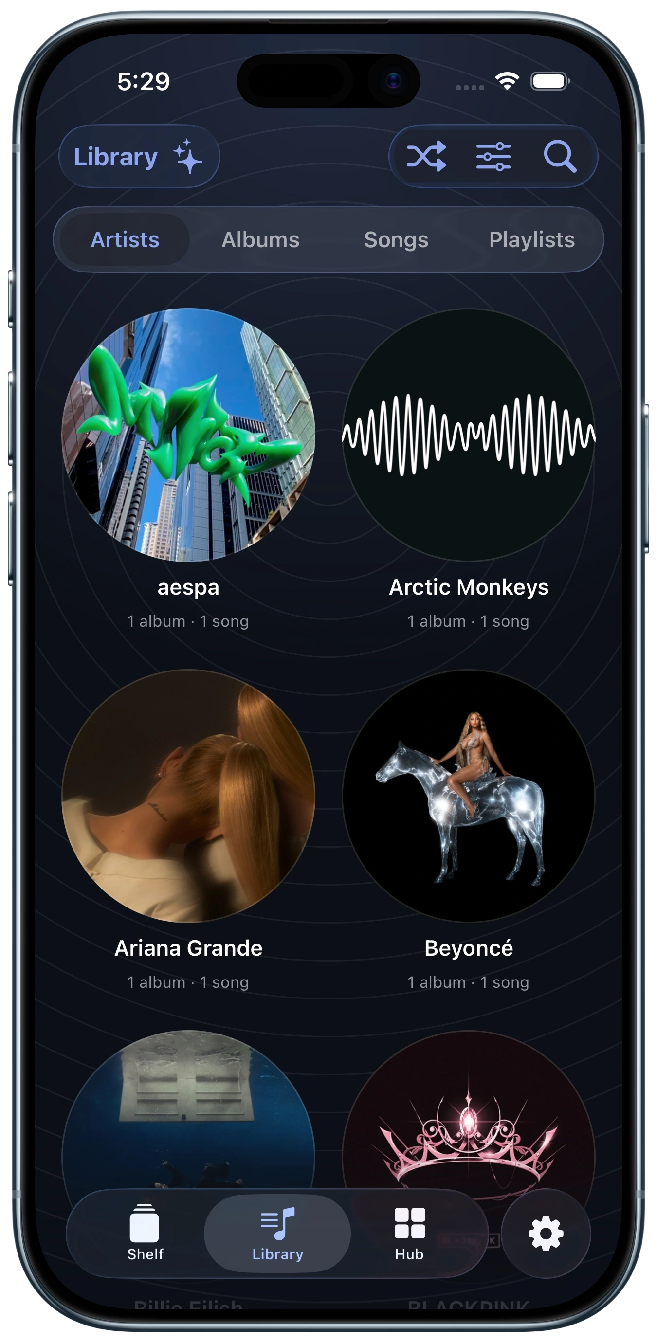 Artists in the aud-io Library shown on an iPhone Air in Sky Blue
